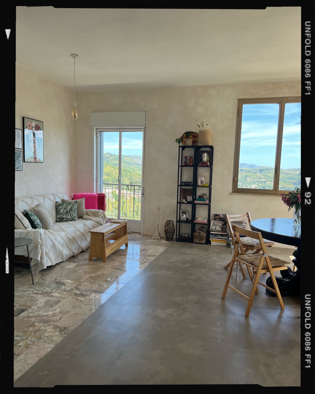 Bright living room with countryside views at Salemi View Apartment