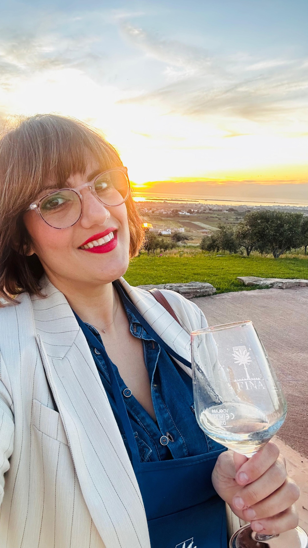 Giusy of Isola Mare at a Sicilian vineyard at sunset